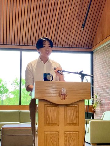 Justin Wu making a speech at his school's history awards ceremony